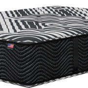 Close-up of Phoenix Two-Sided Firm Mattress corner | Cool-to-the-touch cover and foam-encased support