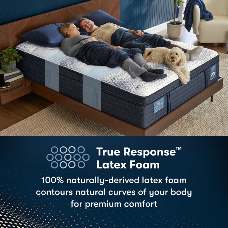 Couple and dog on firm iComfortPro Ambrose Firm Serta latex foam mattress | Contours natural curves for premium comfort