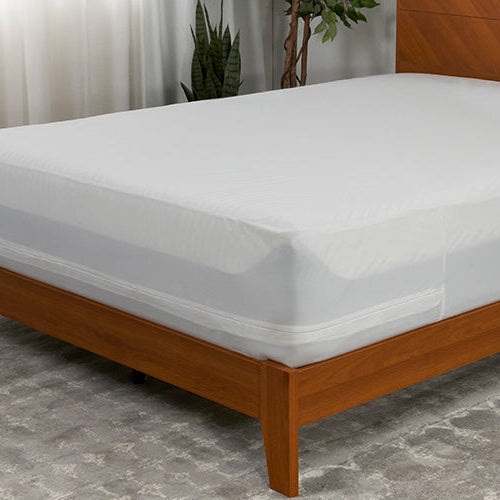 A mattress with an encasement on it. 