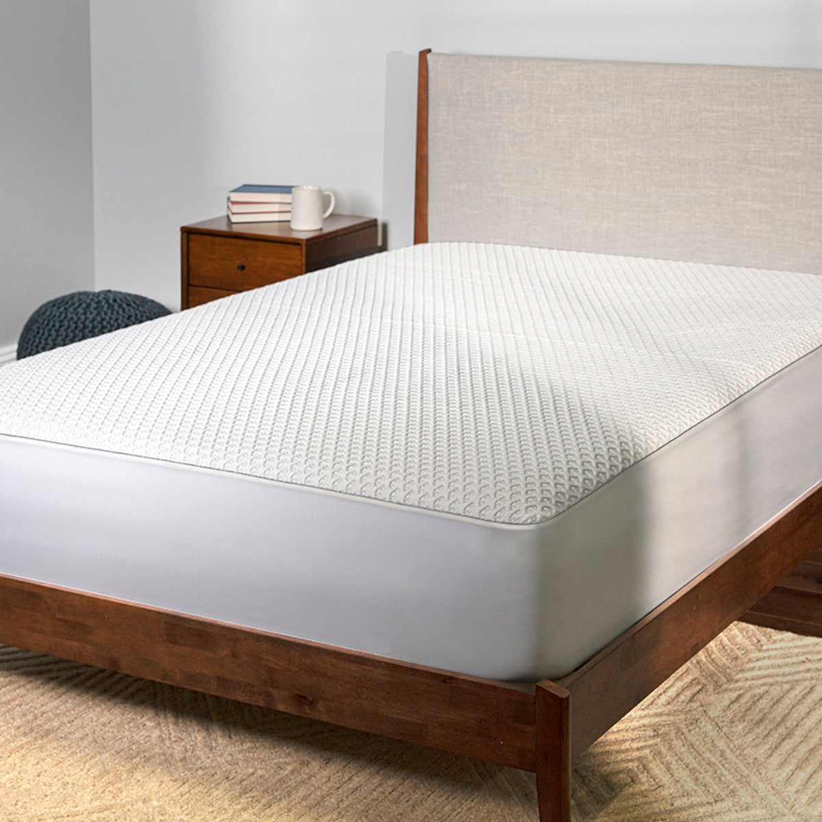 A Ver-tex Mattress protector on a bed.