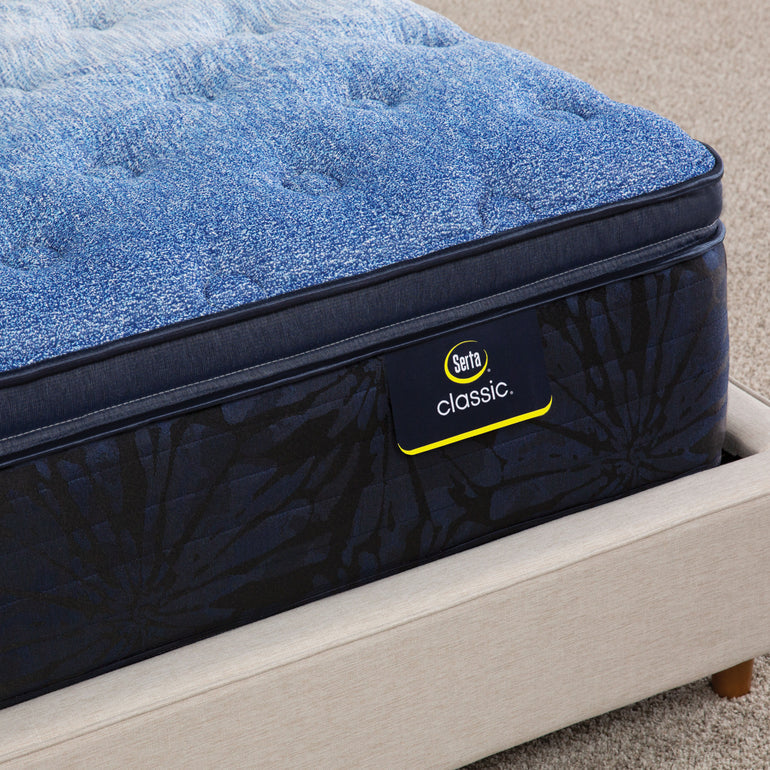 Close-up of Classic Brecon Plush Pillow Top Serta mattress corner | Soft fabric cover and detailed stitching