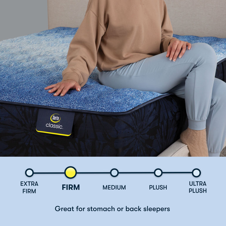 Person sitting on edge of Classic Brecon Firm Serta mattress | Ideal for all sleep positions with firm support