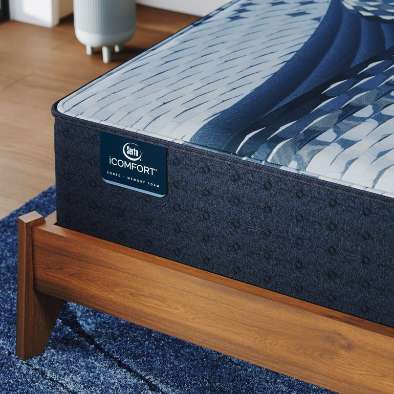 Close-up of iComfort Iona Medium mattress by Serta | Smooth fabric cover and detailed stitching