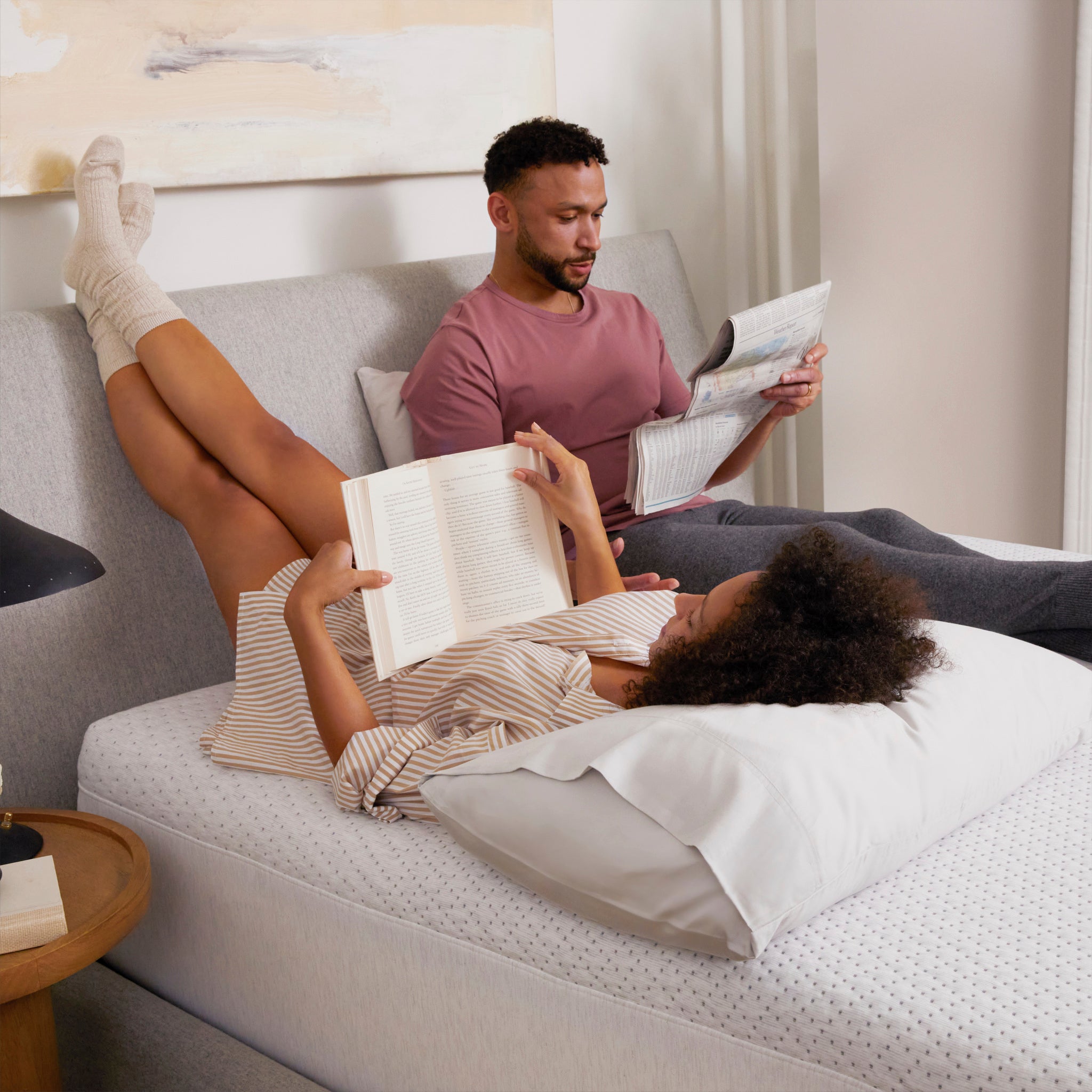 Couple resting on Snow Max Mattress by Casper | Designed for 12+ hours of cooling and motion isolation